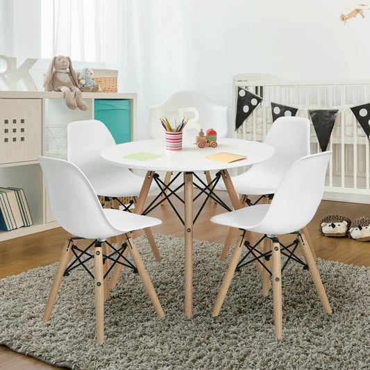 Kids dining chair set, 4 white chairs with wood legs around a round white table on Tampa Home & Garden Store