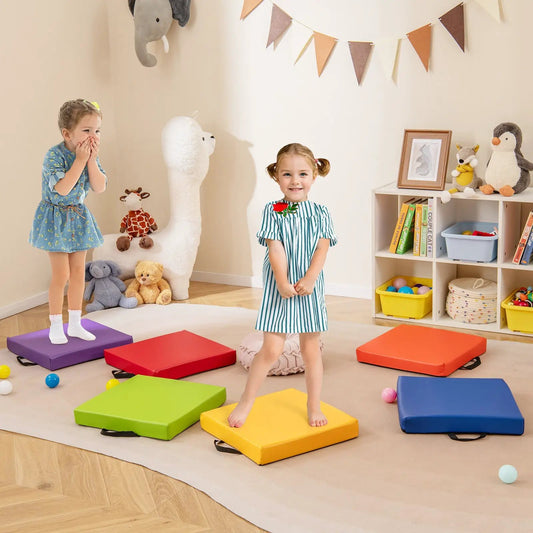 Six 16in square floor cushions in bright multicolor for kids' playroom seating on Tampa Home & Garden Store