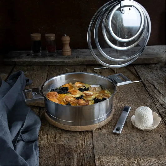 Strate 7-Piece Stainless Steel Cookware Set by Cristel USA, polished stainless pots with lids on Tampa Home & Garden Store