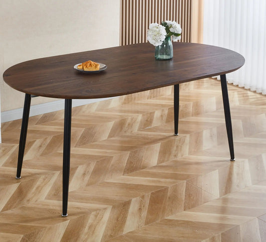 Extensible dining table in dark wood with black metal legs, croissants and hydrangea vase on Tampa Home & Garden Store