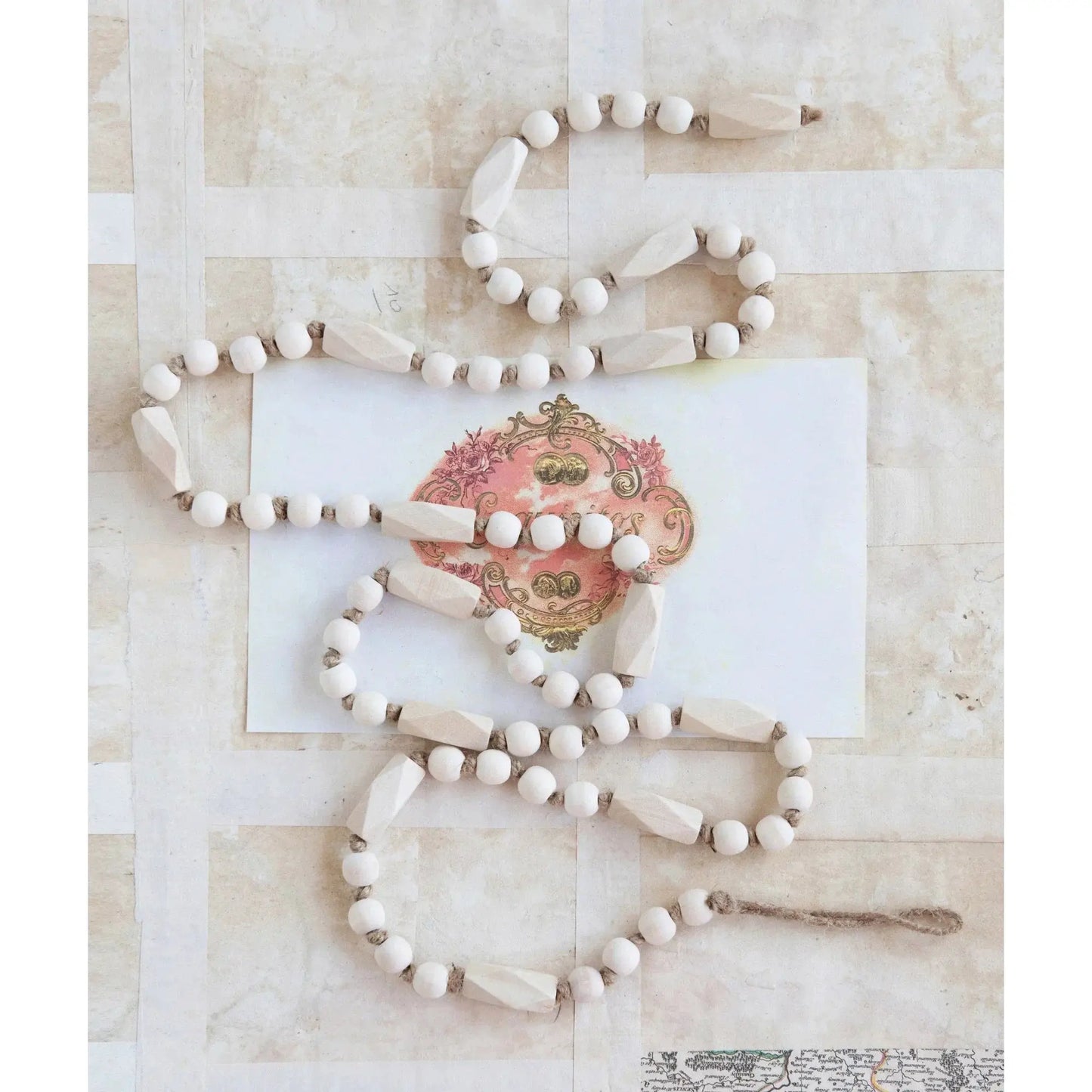 72 Inch Paulownia Wood Bead Garland with white beads and knotted twine on Tampa Home & Garden Store