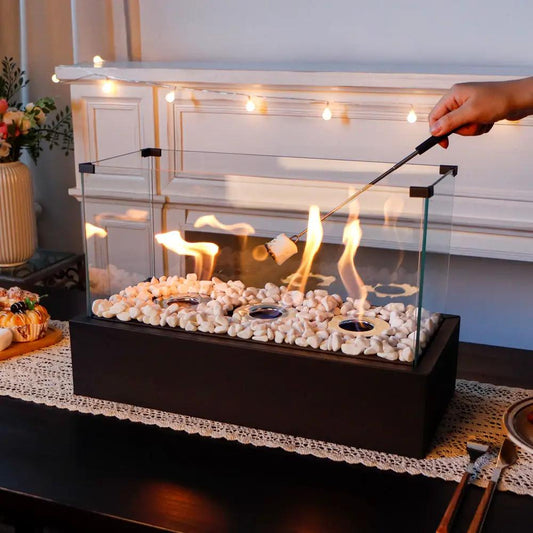 Rectangular alcohol fireplace desktop stove with glass enclosure on a base and white pebbles on Tampa Home & Garden Store