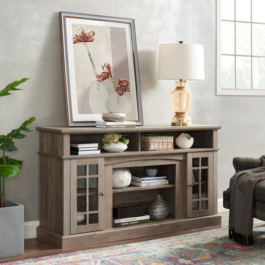 Gray wash 65-inch TV media stand with glass doors and shelves, topped by art on Tampa Home & Garden Store