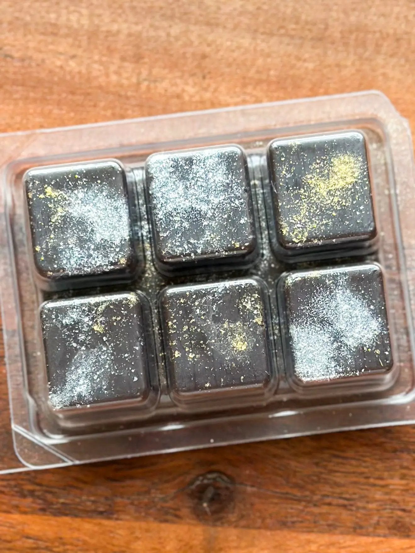 Forgotten Fables Wax Melt Teakwood Moss Leather six dark tarts with gold flecks on Tampa Home & Garden Store