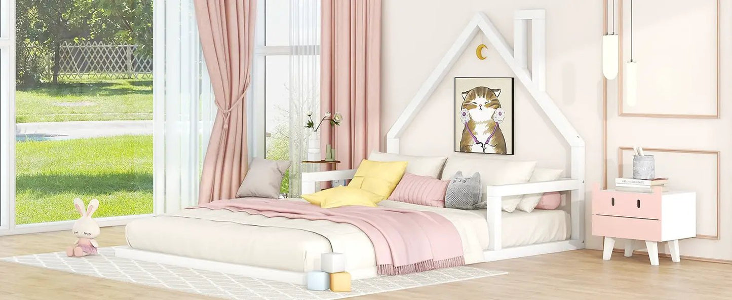 Full-size white wood floor bed with a house-shaped headboard, pastel bedding accent on Tampa Home & Garden Store