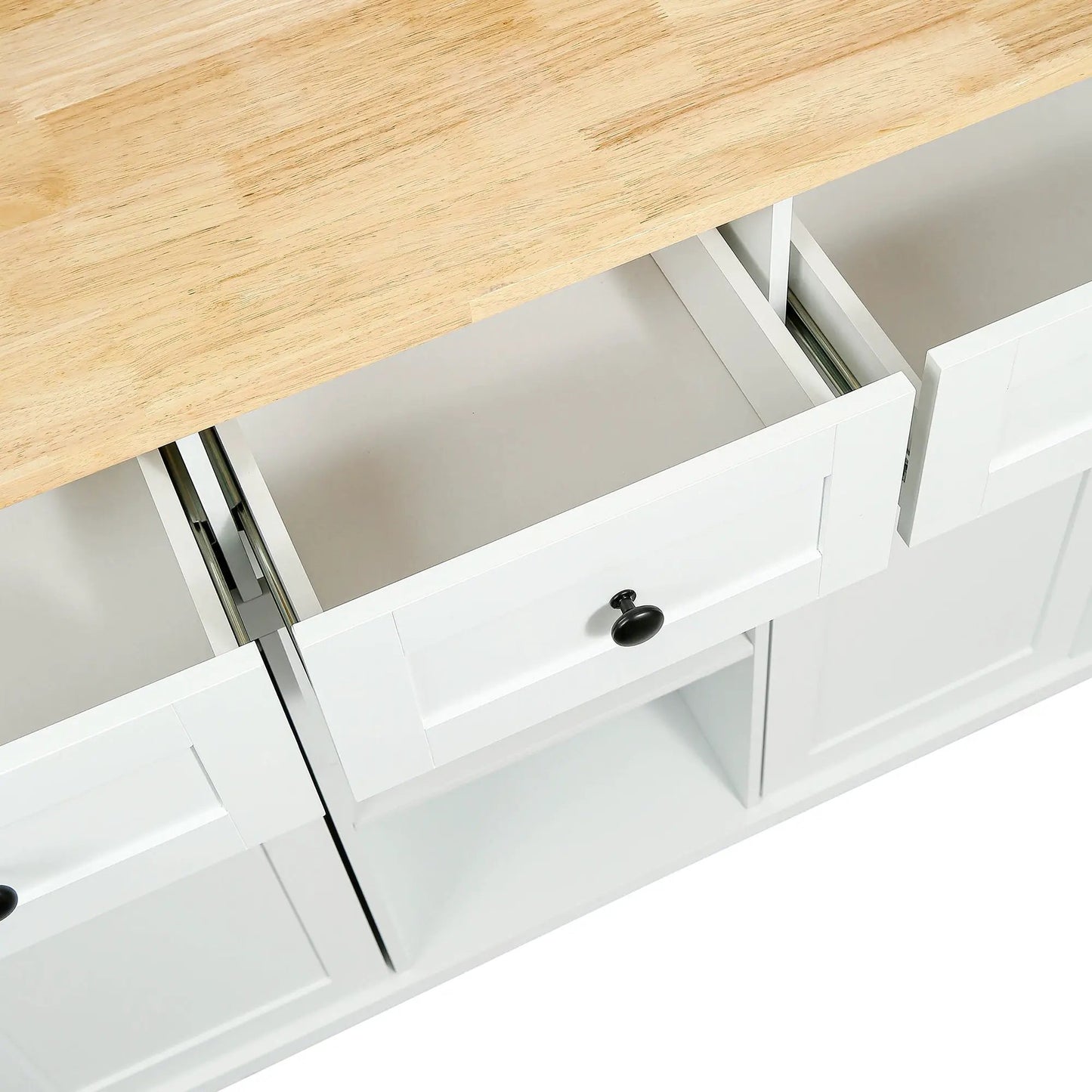 White kitchen cart with rubber wood countertop, white drawers and black knob hardware on Tampa Home & Garden Store