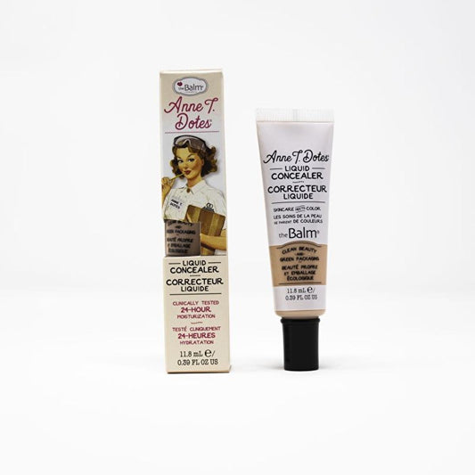 theBalm Anne T. Dotes Liquid Concealer tube with beige shade beside vintage box on Tampa Home & Garden Store