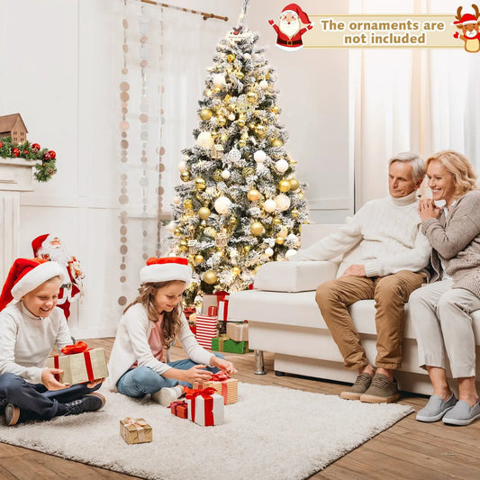 Pre-Lit Snow-Flocked Hinged Christmas Tree, 6 ft, gold and white ornaments in living room on Tampa Home & Garden Store