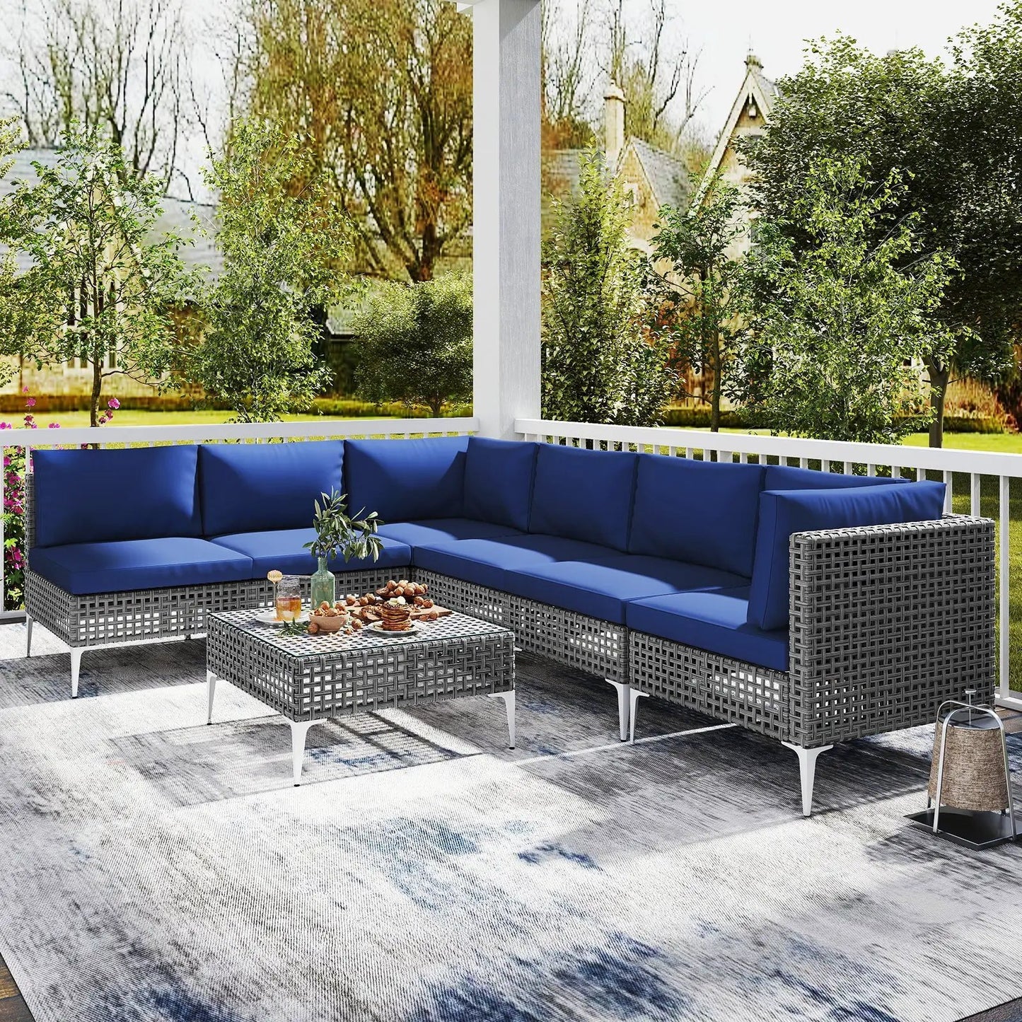 7-Piece Navy Outdoor Wicker Furniture Set with glass-top coffee table on Tampa Home & Garden Store