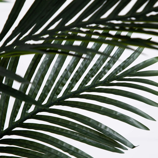 Artificial Palm Tree fronds in lush green tones close-up view on Tampa Home & Garden Store