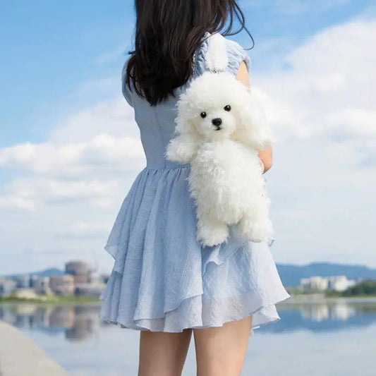 Poodle plush backpack white fluffy dog bag by Chongker Creative worn as everyday backpack on Tampa Home & Garden Store