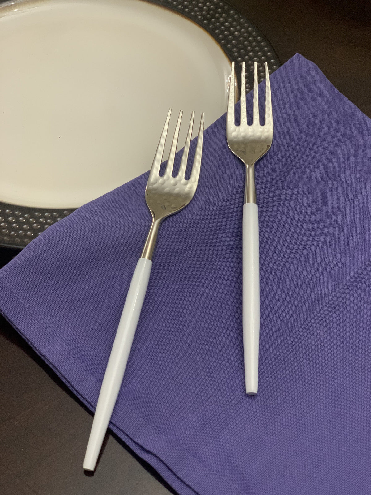 Vibhsa 6pc stainless steel dinner forks hammered-mouth 2 forks on purple napkin on Tampa Home & Garden Store