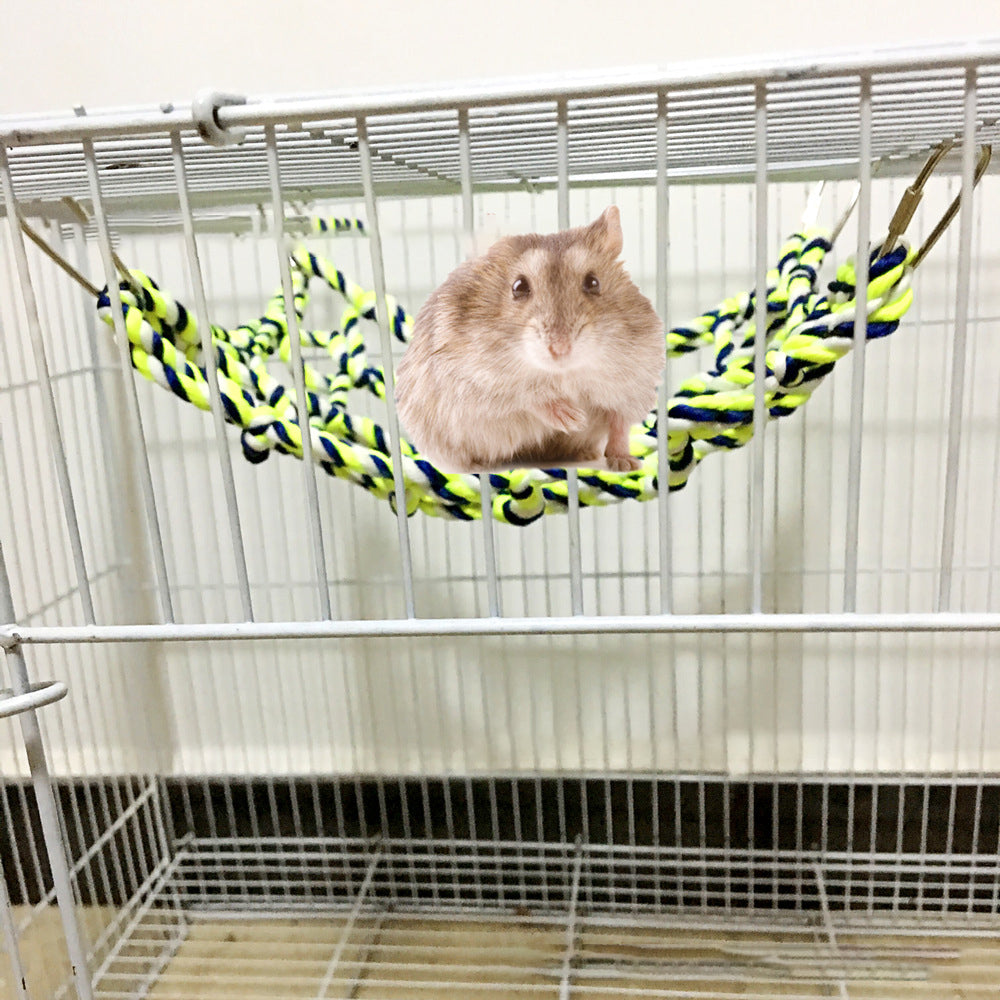 Parrot climbing net bird toy in neon green, blue braided rope inside a wire cage with a hamster on Tampa Home & Garden Store