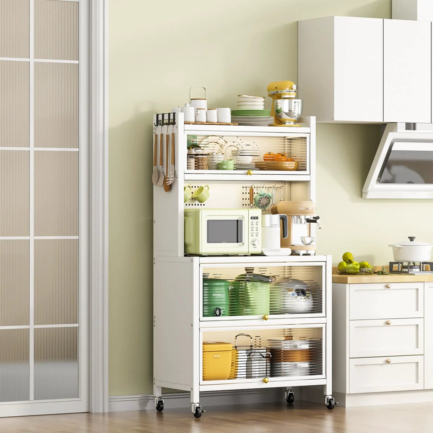 White metal storage cart on wheels with hanging utensils and stacked dishes, yellow mixer on Tampa Home & Garden Store