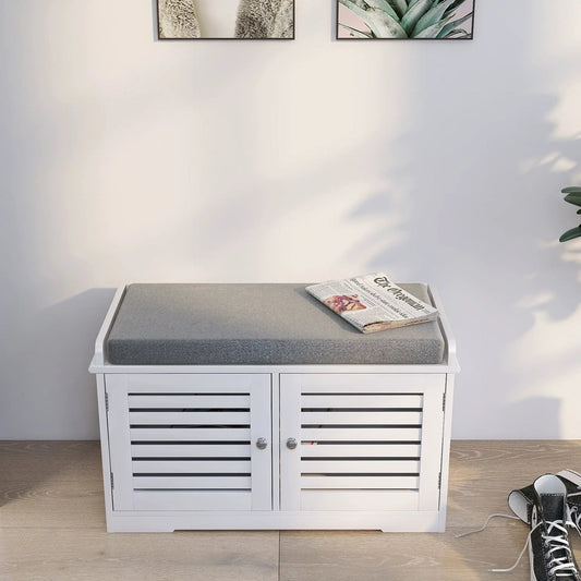 White shoe storage bench with padded gray cushion and slatted cabinet doors on Tampa Home & Garden Store
