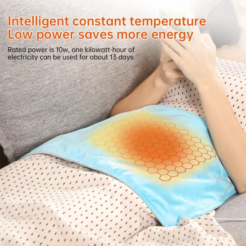 Blue USB heating pad with honeycomb heating zone on abdomen for cramps and back pain on Tampa Home & Garden Store