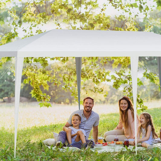 GemGear 10x20 ft waterproof canopy tent in white with tent pegs and wind ropes; family picnic on Tampa Home & Garden Store