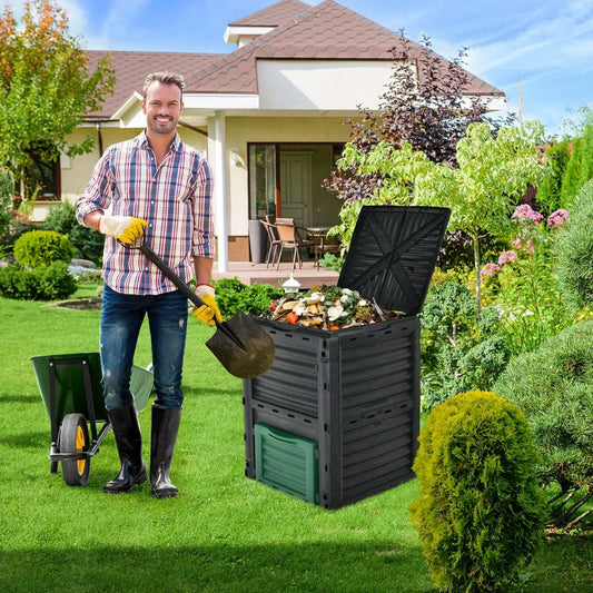 80 gallon outdoor composter with openable lid, black plastic body in a sunny yard on Tampa Home & Garden Store