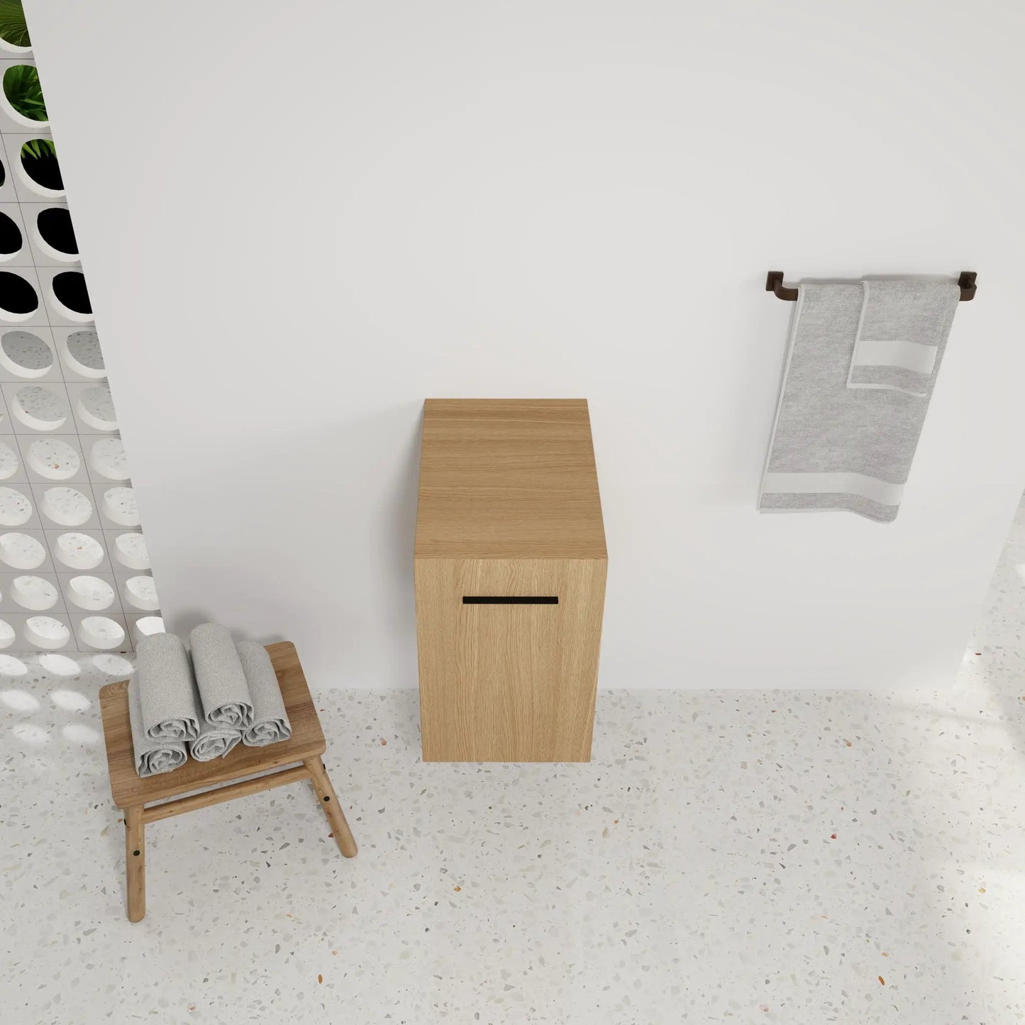 Floating bathroom vanity base in light oak with single door, wall-mounted storage on Tampa Home & Garden Store