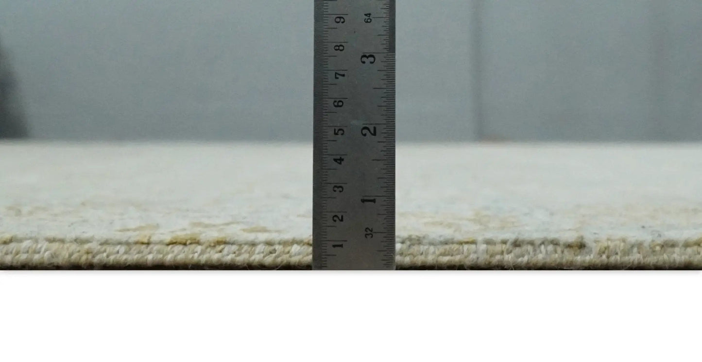 8x10 Fine Hand Knotted Beige and Gold Wool Rug with measuring ruler in foreground on Tampa Home & Garden Store
