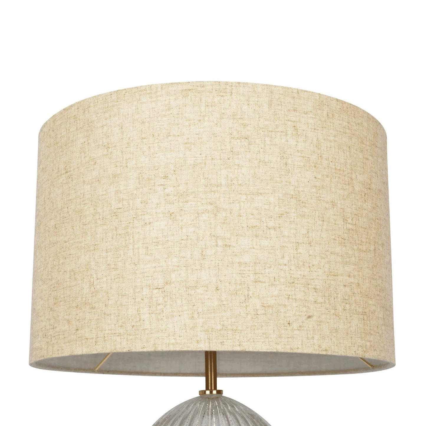 Table lamp with large beige linen shade and ribbed clear base with gold hardware on Tampa Home & Garden Store