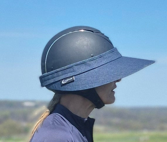 EquiVisor Original Sun Protection sun visor with blue denim brim worn under a riding helmet on Tampa Home & Garden Store