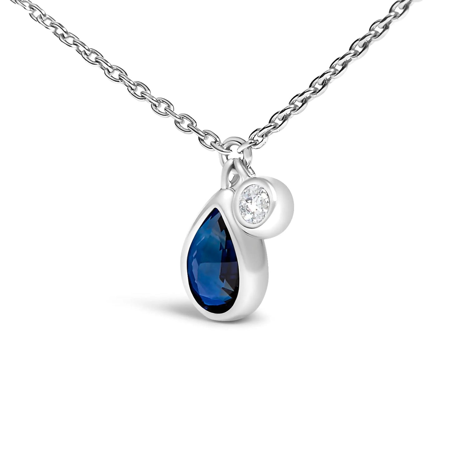 Pendant necklace in 14K white gold with pear blue sapphire and diamond accent by Bids on Tampa Home & Garden Store