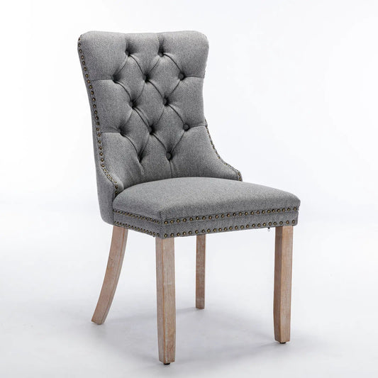 Modern tufted linen dining chair gray with button back nailhead trim wood legs on Tampa Home & Garden Store