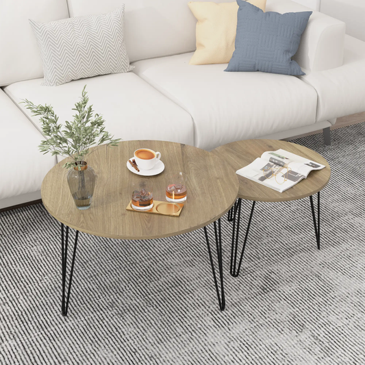 Round nesting coffee tables set of 2 with wood tops and black hairpin legs in living room on Tampa Home & Garden Store