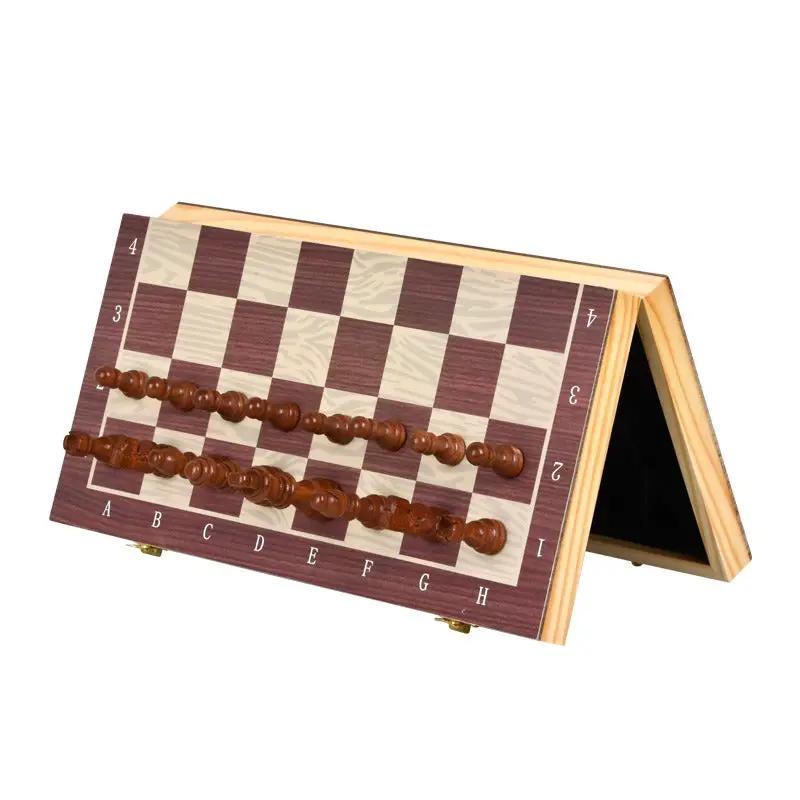 Wooden magnetic chess set with solid wood brown pawns on a foldable two-tone travel board on Tampa Home & Garden Store