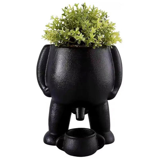 Funny Peeing Vase Planter black ceramic statue with plant on head, quirky home garden decor on Tampa Home & Garden Store