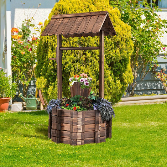 Outdoor Wooden Wishing Well Planter Bucket on a frame with pink and purple petunias hanging on Tampa Home & Garden Store