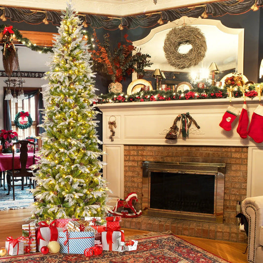 9 ft pre-lit snow-flocked hinged Christmas tree DirectDeals in a festive living room with gifts on Tampa Home & Garden Store