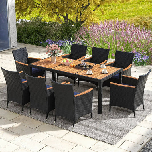 9-Piece Outdoor Dining Set with Acacia Tabletop and black wicker chairs on Tampa Home & Garden Store