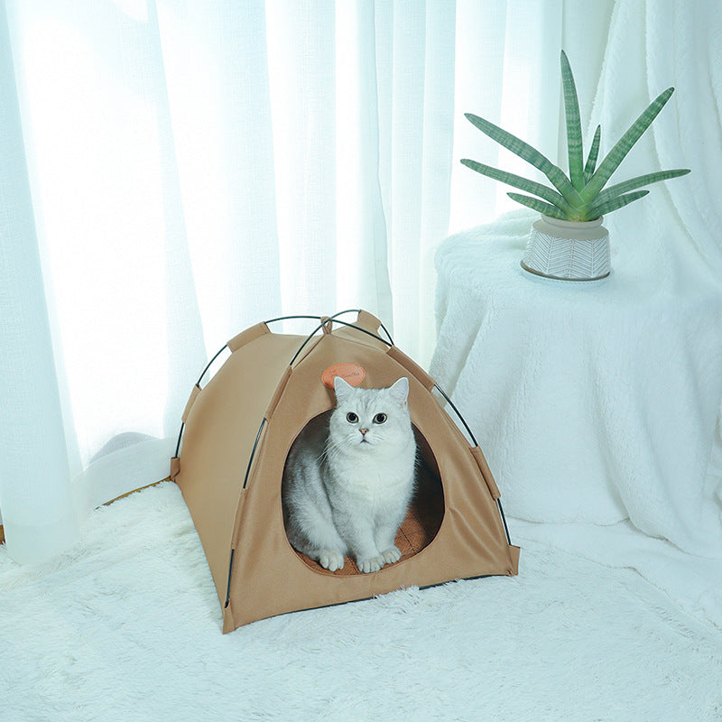 Foldable cat outdoor canvas tent tan with rounded front entry, cat sits inside on Tampa Home & Garden Store