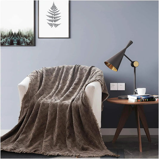 Kasentex Cotton Throw Blanket Soft Knitted brown lattice draped over sofa in modern living room on Tampa Home & Garden Store
