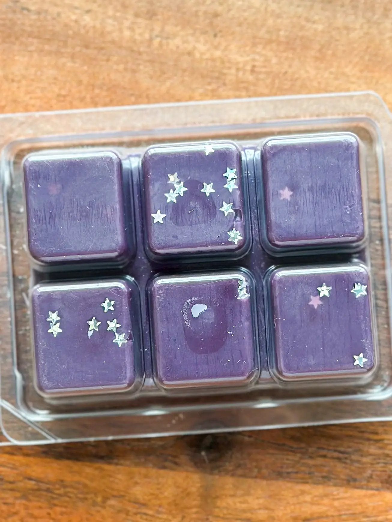Hidden Library Wax Melt Teakwood and Plum purple wax melts with silver star glitter in a 6-pack on Tampa Home & Garden Store