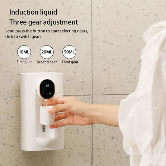 White wall-mounted mouthwash dispenser with black control panel and compact cup on Tampa Home & Garden Store