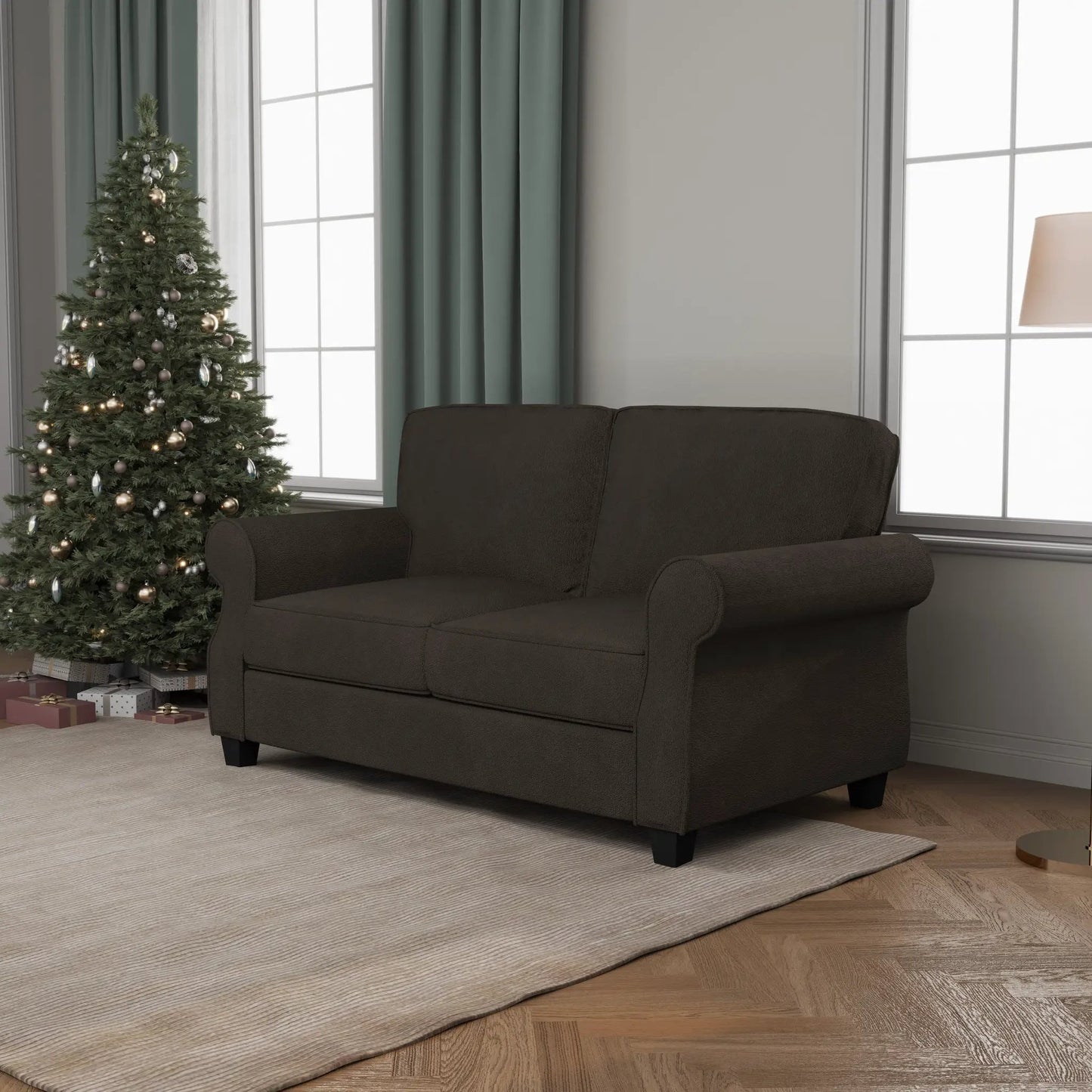 Solid wood framed sofa with deep seats in dark brown upholstery beside a Christmas tree on Tampa Home & Garden Store