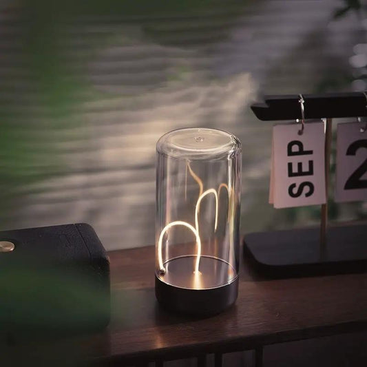 Magnetic Light Mini Desktop Nightlight with glass dome, black base, warm filament glow on Tampa Home & Garden Store