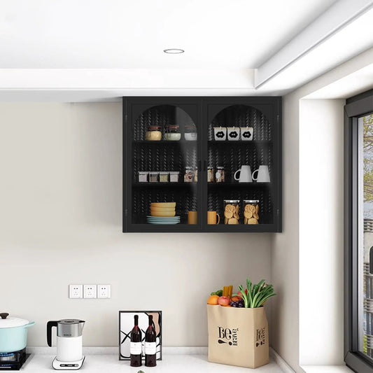 Two-door black glass-door wall cabinet with interior shelves displaying jars, mugs and bottles on Tampa Home & Garden Store
