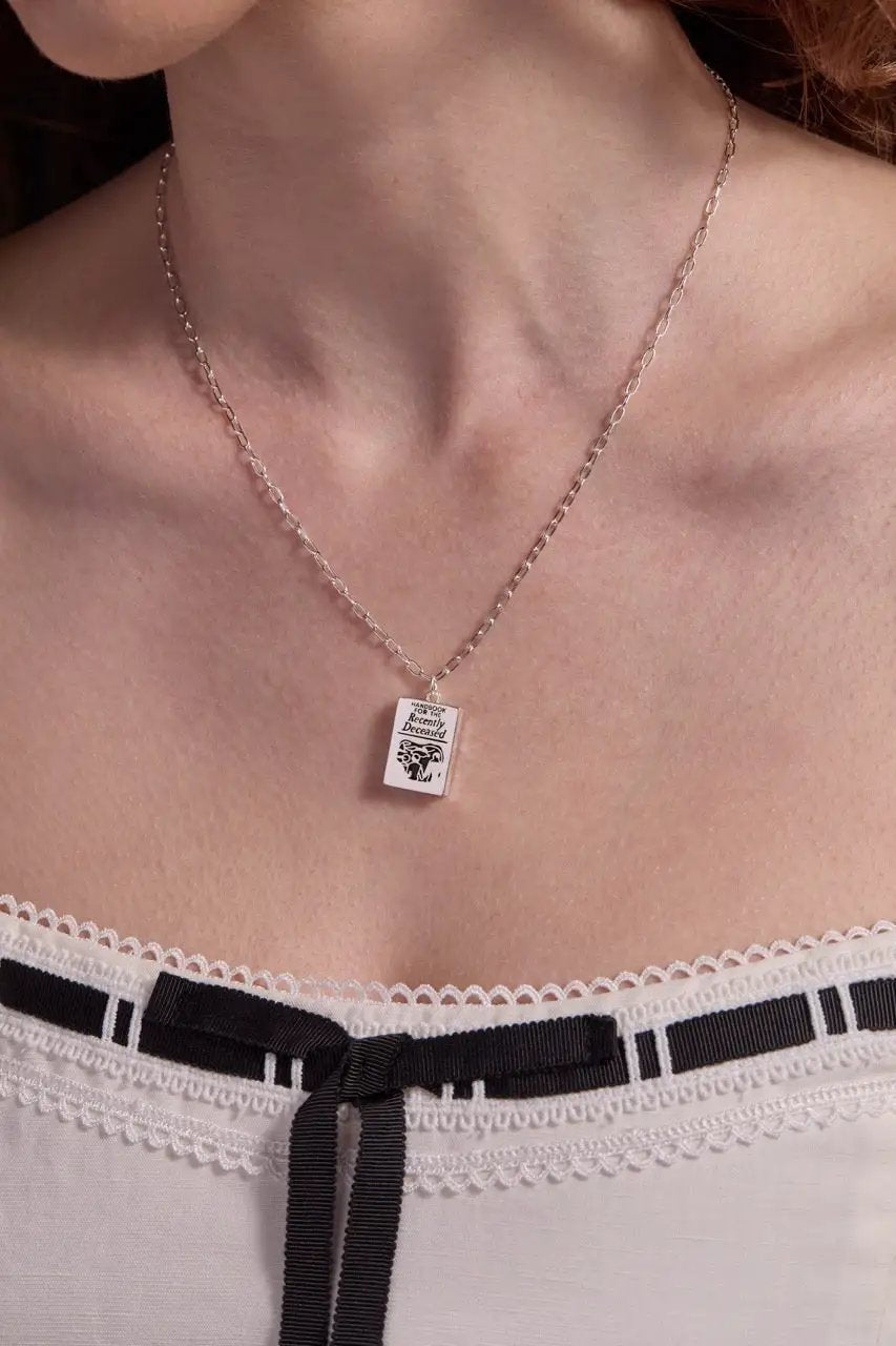 Beetlejuice Handbook pendant necklace by ALEX AND ANI; rectangular book charm on silver chain on Tampa Home & Garden Store