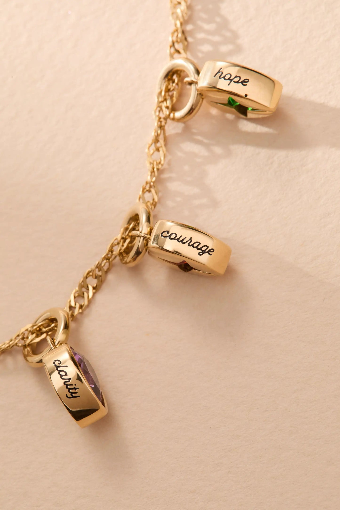 January Courage Heart Birthstone Charm, gold-tone charm with purple gemstone on Tampa Home & Garden Store