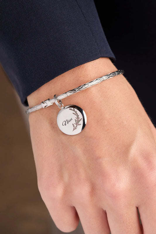 Niece Lavender Disc Charm on a silver braided bracelet by ALEX AND ANI with a sprig on Tampa Home & Garden Store