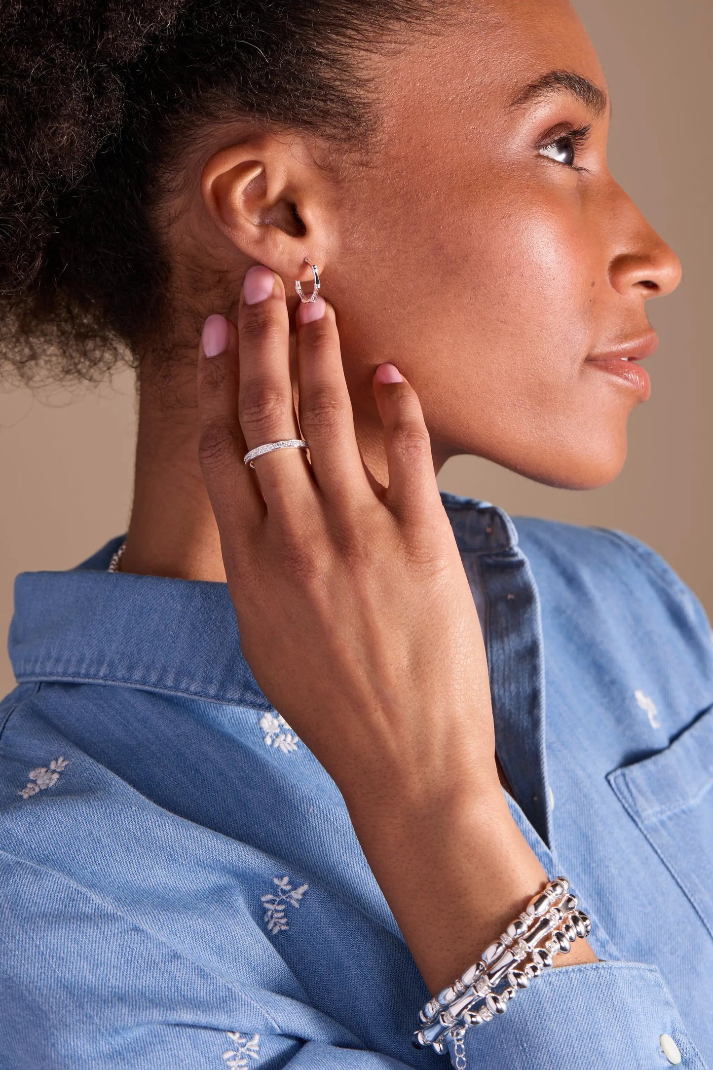 Bamboo Wrap Bracelet by ALEX AND ANI, wrap bracelet on model's wrist with silver bracelet on Tampa Home & Garden Store