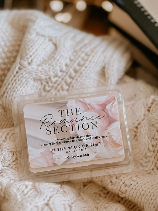 Romance Wax Melt by In the Wick of Time; clear clamshell with pink rose label on knit blanket on Tampa Home & Garden Store