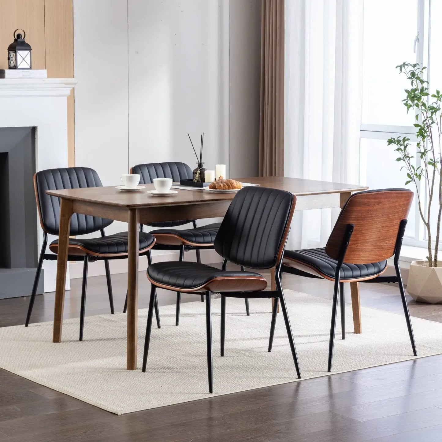 Two Piece Mid Century Retro Faux Leather Chairs with black tufted seats and wood frames on Tampa Home & Garden Store