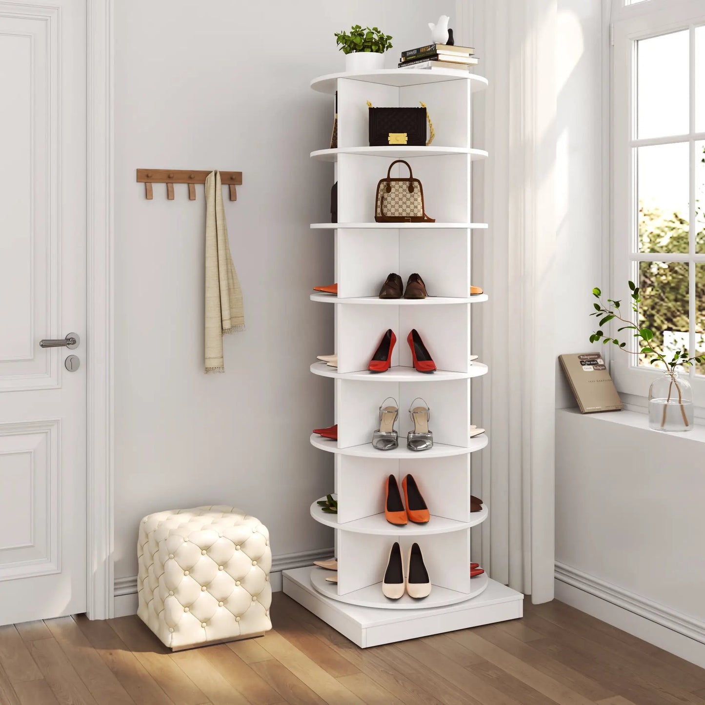 360 Rotating Shoe Cabinet with 7 white shelves holding 28 pairs and handbags in a bright corner on Tampa Home & Garden Store