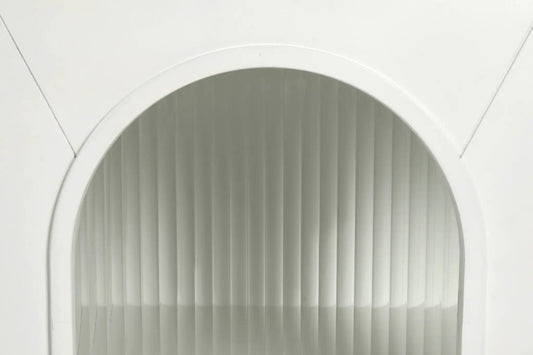 Antique white arch window frame with vertical gray blinds close-up on Tampa Home & Garden Store