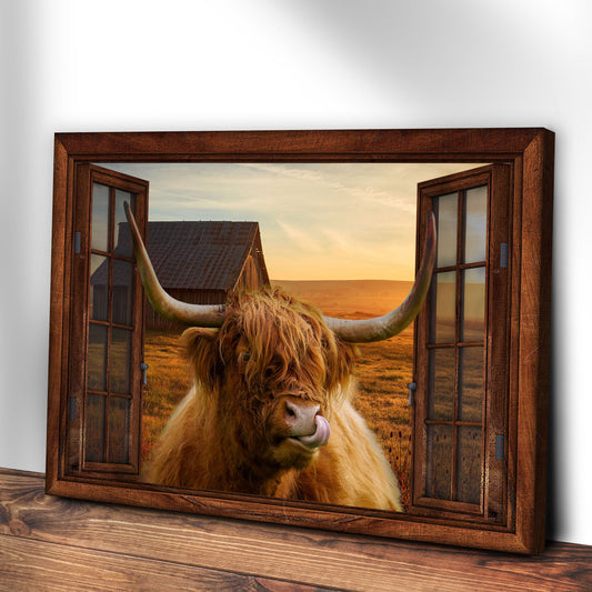 Highland Cow Window View Canvas Wall Art in a rustic wood frame with a long-horned cow at sunset on Tampa Home & Garden Store